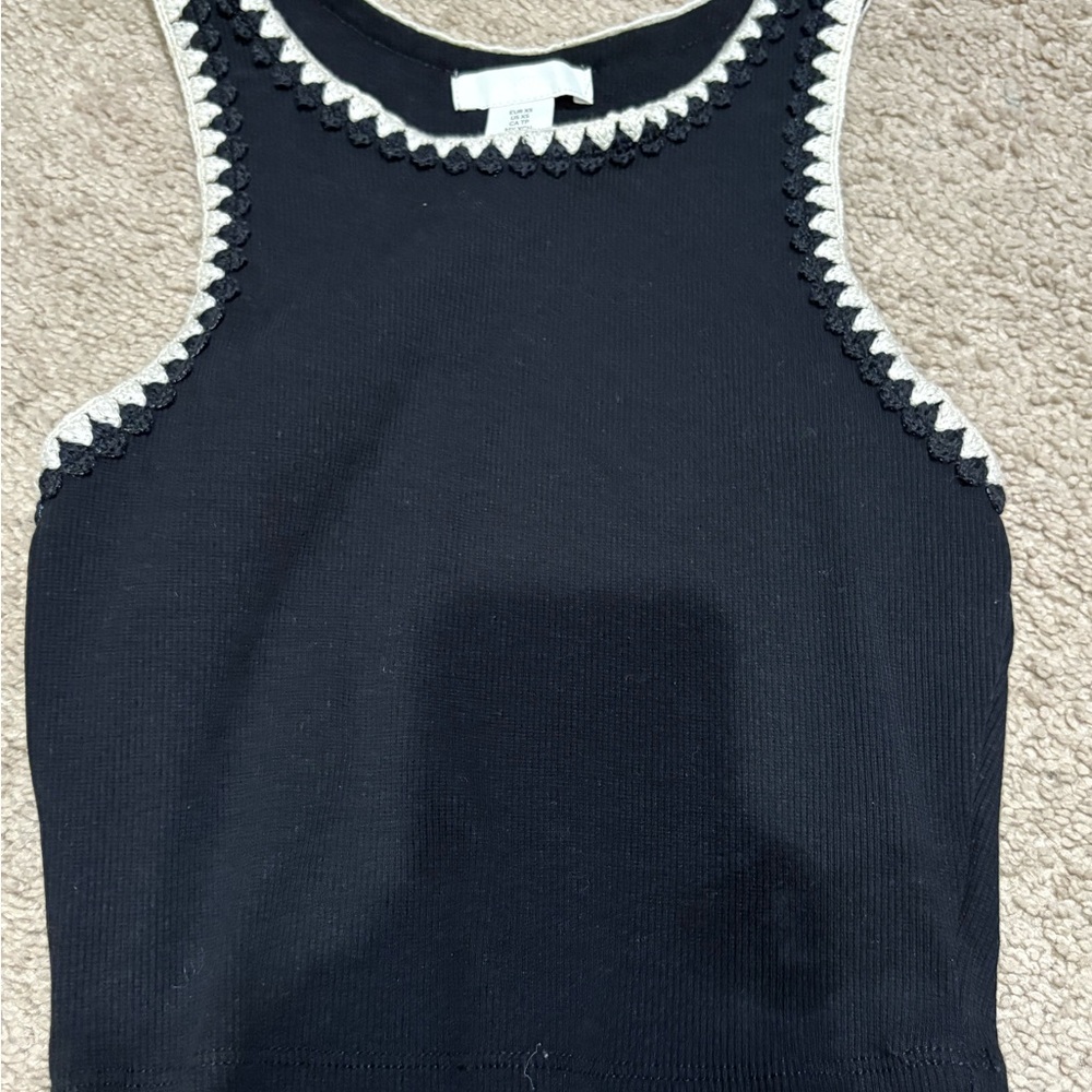 Black Sleeveless Top with White Trim